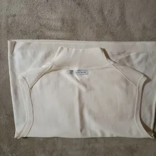 Chaleco de punto beige sin mangas