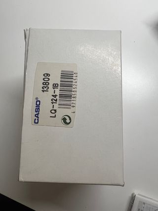 Caja de reloj Casio azul y plateada