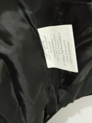 Gilet imbottito nero con cappuccio