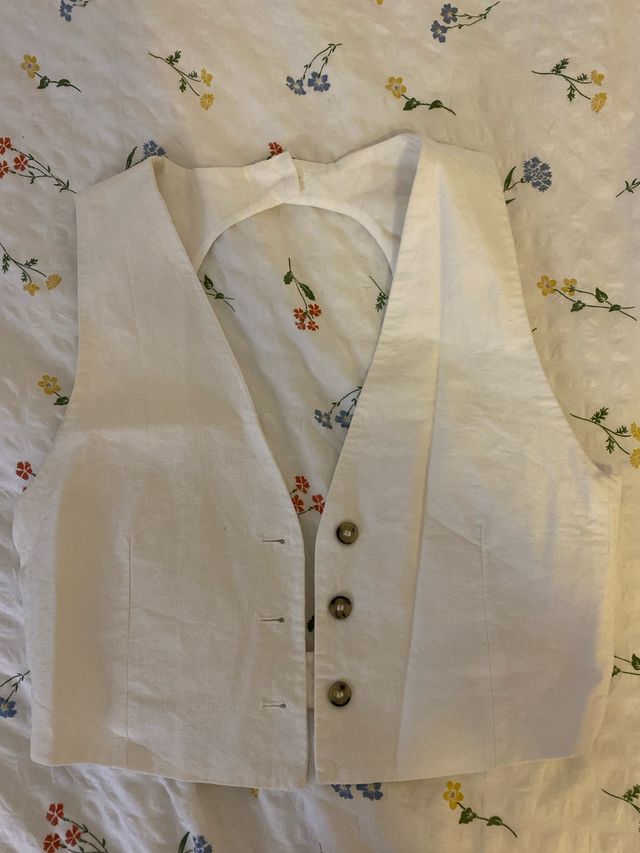 Chaleco blanco espalda descubierta