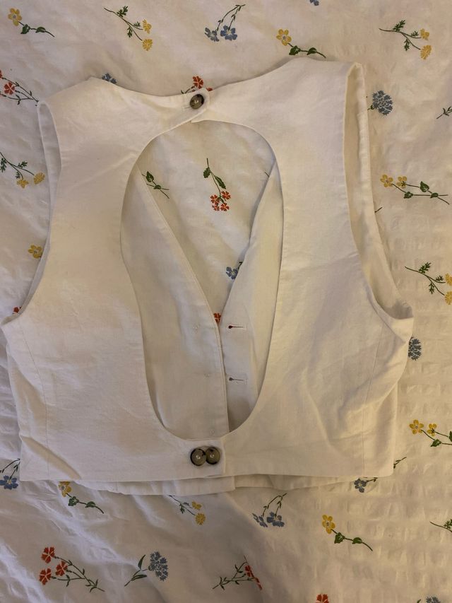 Chaleco blanco espalda descubierta