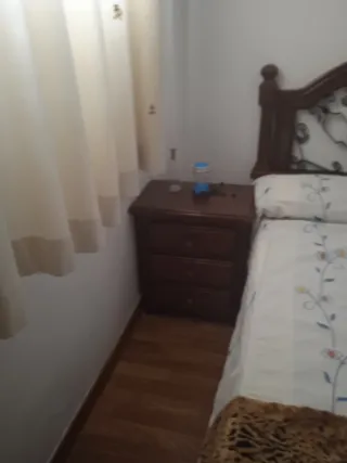 Cabecero de cama de madera y forja