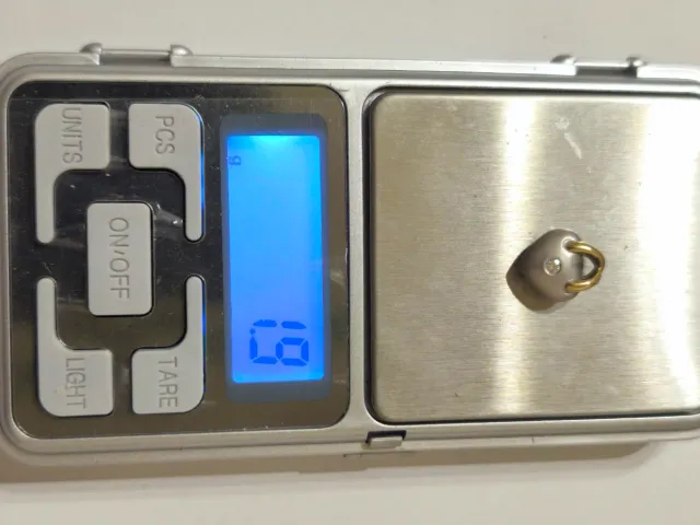 Dije colgante corazón diamante central  oro blanco