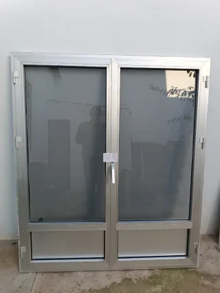 Ventana aluminio abatible doble