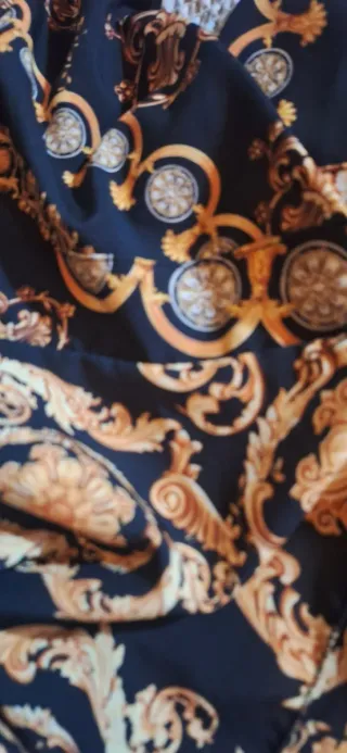 Vestito lungo nero e oro