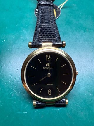 Reloj Tornelli Negro y Dorado