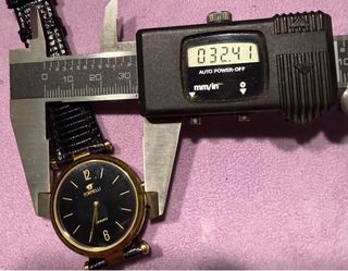 Reloj Tornelli Negro y Dorado