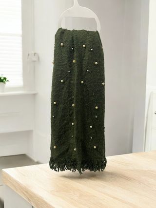 Bufanda verde con perlas