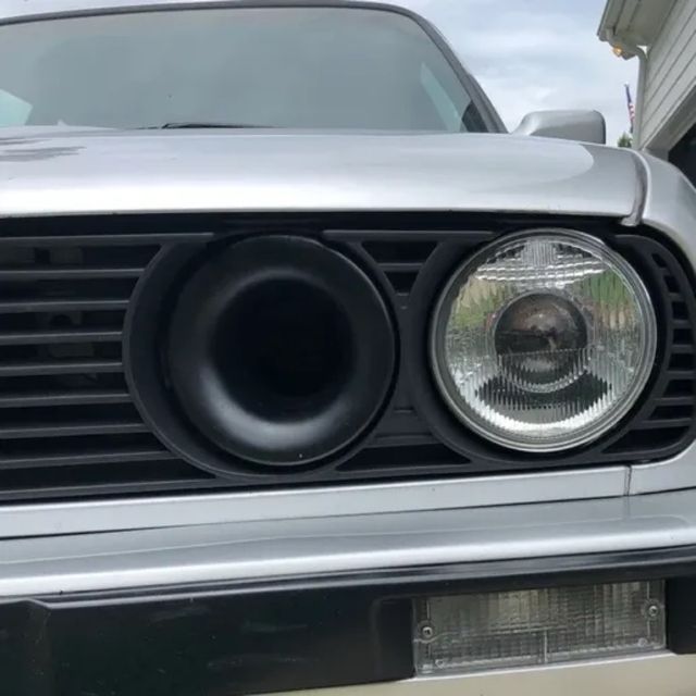 Toma de aire en faro para BMW E30