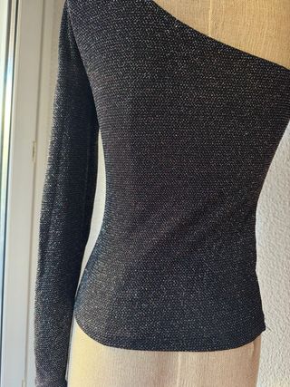 Top asimetrico brillantes