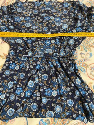 Top floral manga larga con lazada