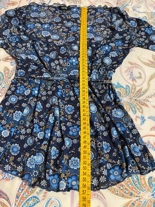 Top floral manga larga con lazada