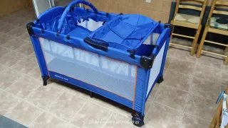 Cuna de viaje plegable azul