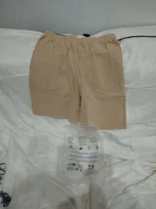 Pantalones cortos beige talla L