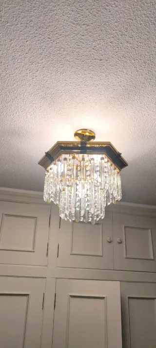 Lámpara araña de cristales dorada