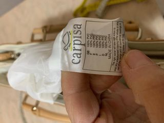 Borsa bianca in ecopelle con dettagli metallici