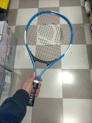 Raqueta de tenis azul