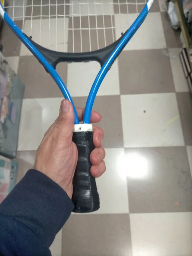 Raqueta de tenis azul