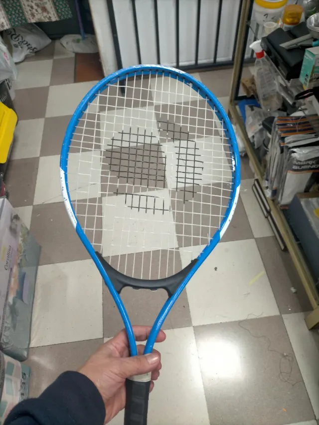 Raqueta de tenis azul