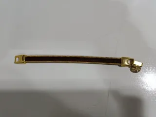 Pulsera Piel de Potro burdeos y Ribete Dorado