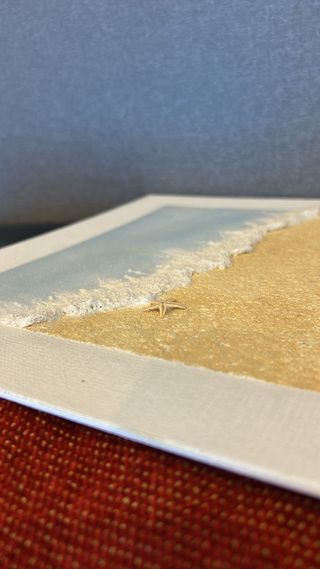 Cuadro mar relieve arena y ola