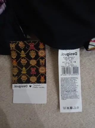 Leggings negros DESIGUAL con estampado multicolor