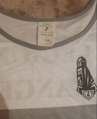 Camiseta tirantes running gris y blanco