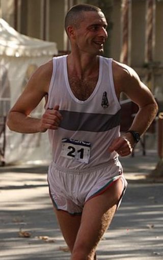 Camiseta tirantes running gris y blanco