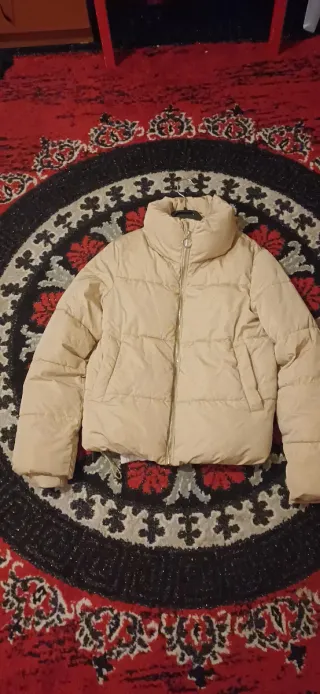 Abrigo beige acolchado