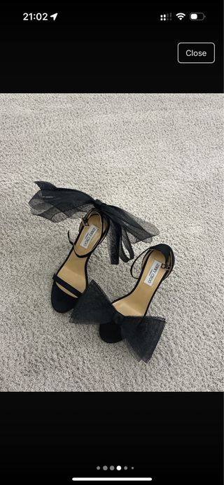 Tacones Jimmy Choo negros con lazo