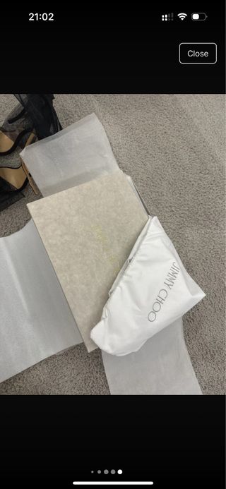 Tacones Jimmy Choo negros con lazo