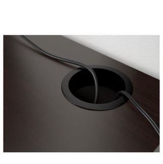 Escritorio negro con cajones y patas metálicas