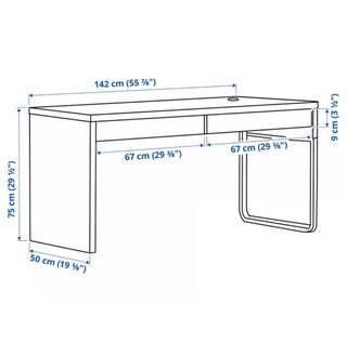 Escritorio negro con cajones y patas metálicas