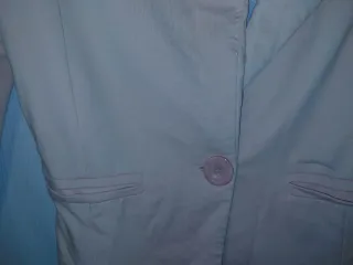 Americana rosa con puños estampados