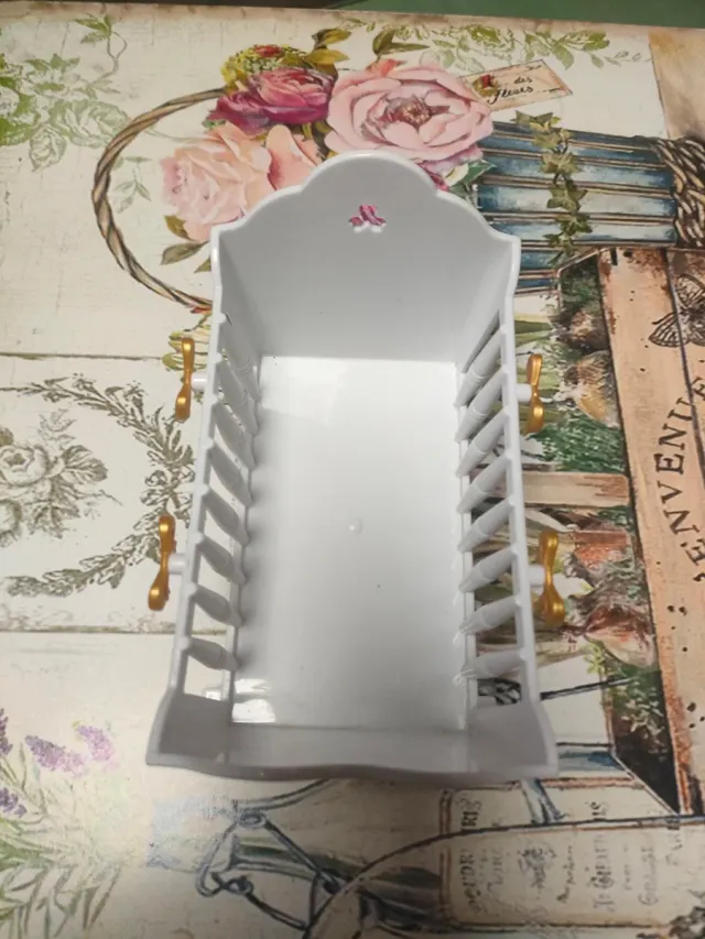 Culla Barriguitas con nastri dorati