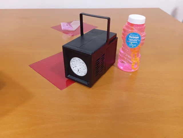 Máquina de burbujas con líquido