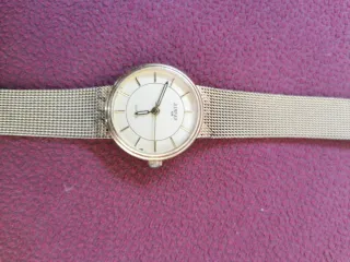 Reloj DIMAX dorado con correa de malla