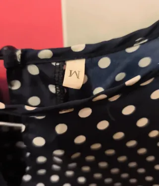 Blusa de lunares negra y blanca
