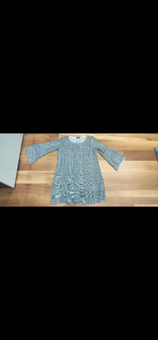 Vestito a quadri grigio e bianco