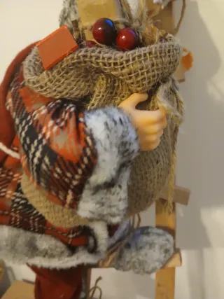Babbo Natale con scaletta e sacco