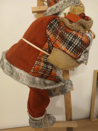 Babbo Natale con scaletta e sacco