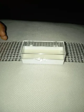 Diente de tiburón en caja