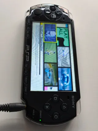 PSP Negro 2004 + WWE SmackDown vs Raw 2009