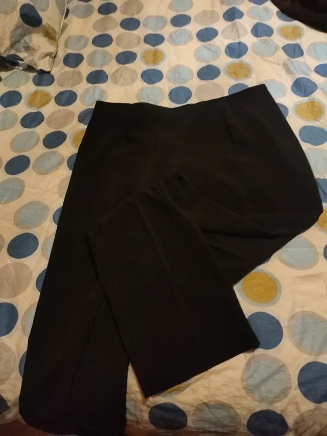 Pantalones negros chica