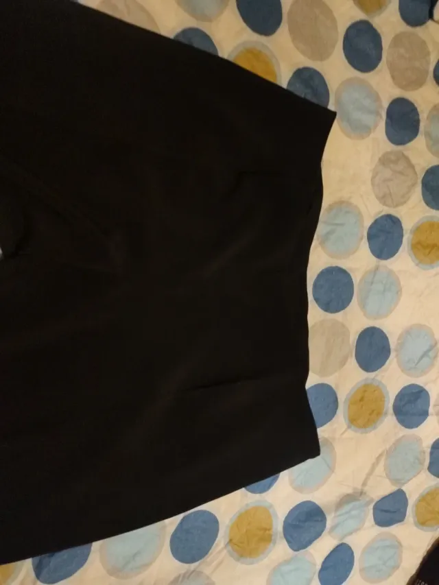 Pantalones negros chica