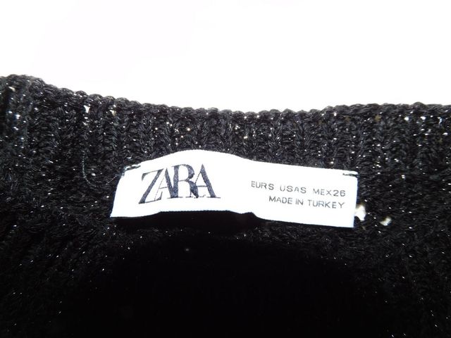 Chaleco Zara negro con flecos