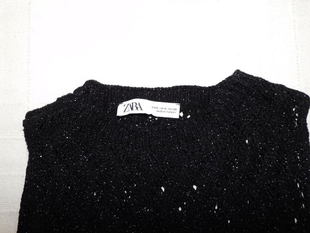 Chaleco Zara negro con flecos