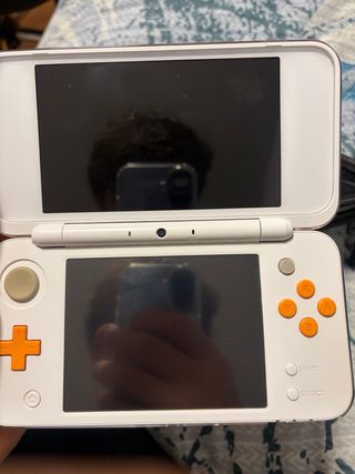 new Nintendo 2DS XL Naranja y Blanco