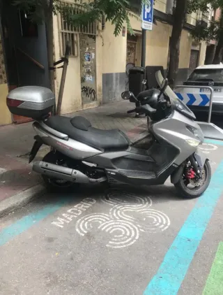 Kymco Xciting 500 cambio por 125