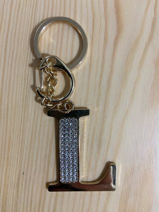 neceser gris fieltro y llavero letra